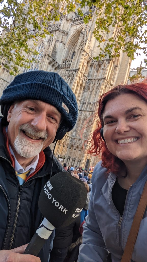 Man and woman with BBC Radio York microphone.